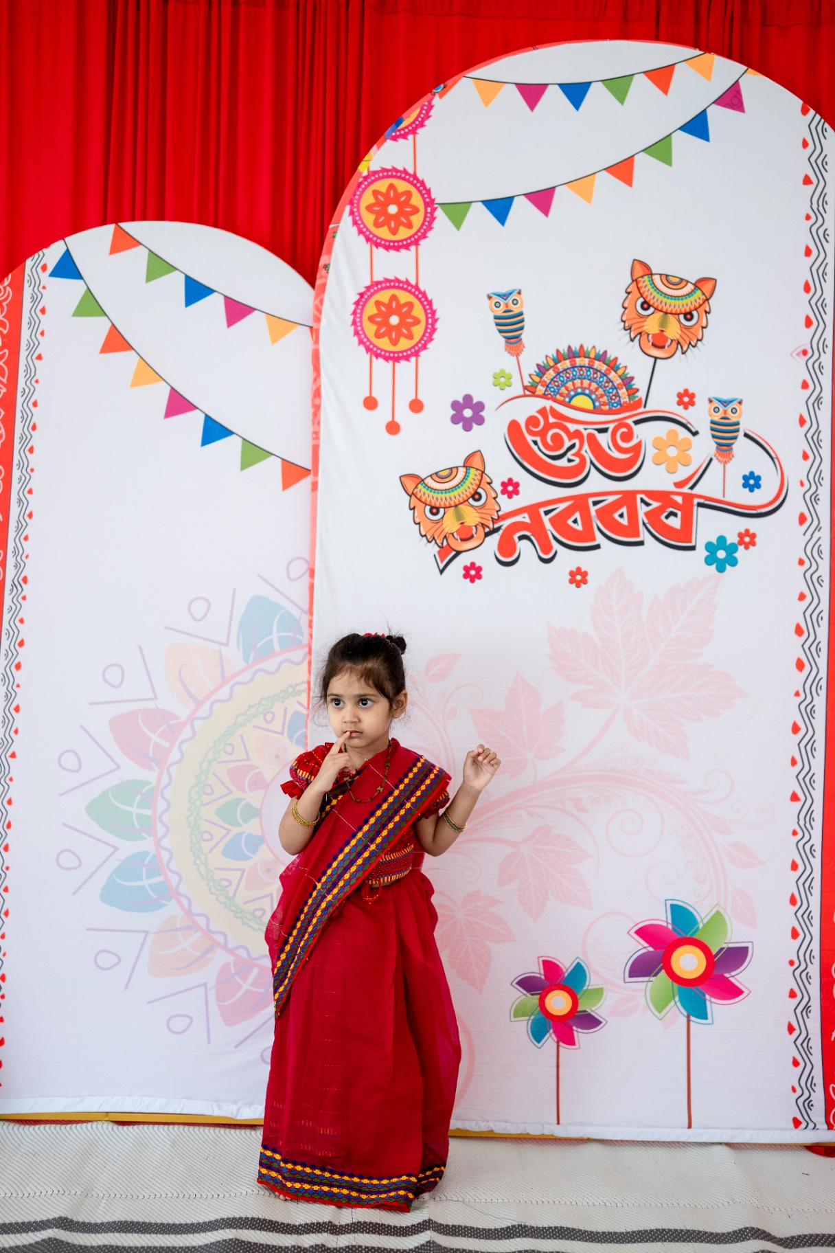 Faatiha in a red traditional outfit