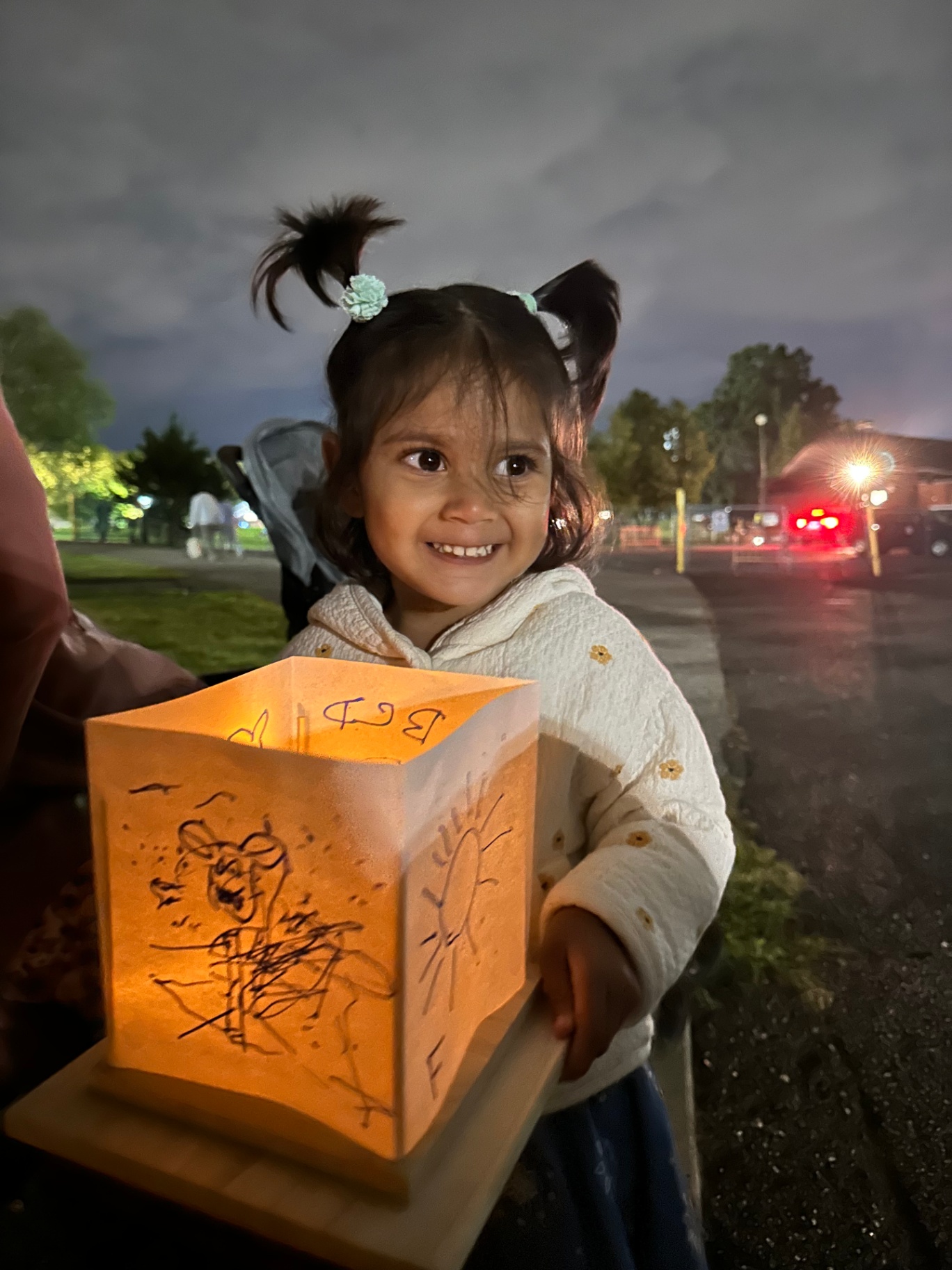 Faatiha holding a glowing lantern