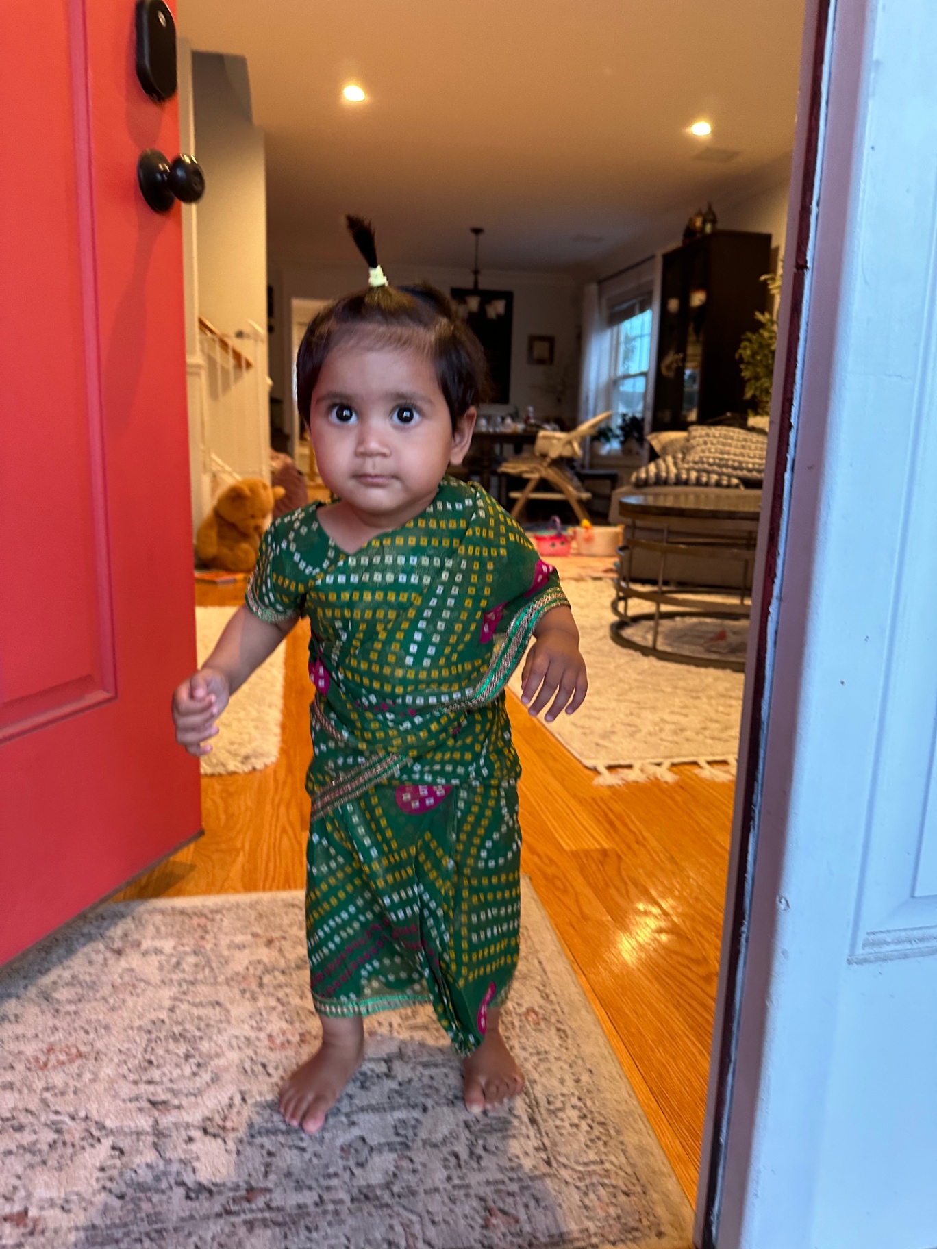Faatiha in a green traditional outfit